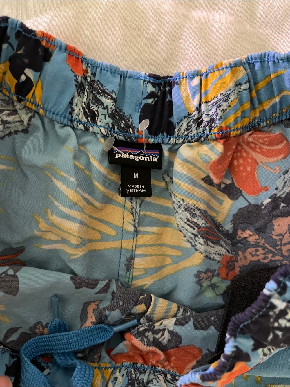Patagonia Baggies Blue Floral Shorts with Orange Accent - Picture 2 of 4